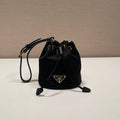 MINI BUCKET BAG 10 IN BLACK RE-NYLON AND SAFFIANO LEATHER STRAP