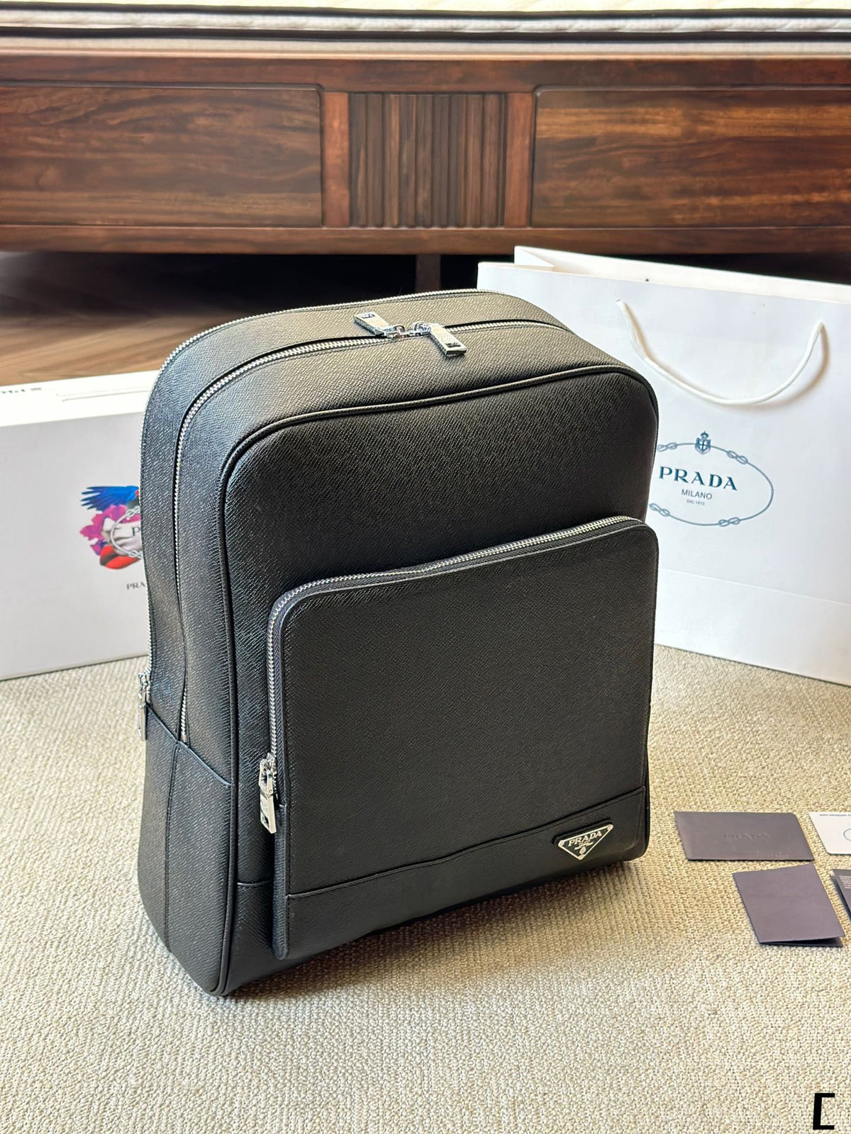 FRONT ZIP POCKET BACKPACK 38 IN BLACK GRAINED CALFSKIN